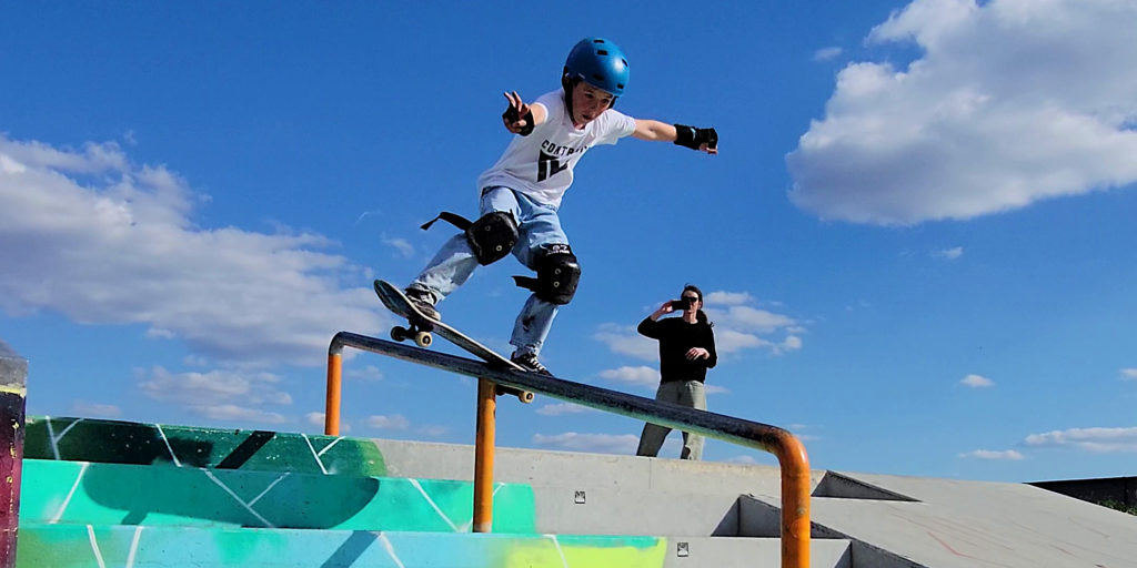 Boardslide Downrail with Contract 5 Skateboard